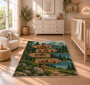 Camping Trail Signpost rug in a nursery beside a crib and dresser