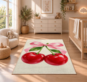 Cherry Bow Rug in a nursery beside a crib and dresser