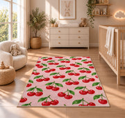 Cherry Pattern Rug in a nursery beside a crib and dresser