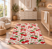 Cherry Heart Rug in a nursery beside a crib and dresser