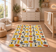 Construction Tools Pattern Rug in a nursery beside a crib and dresser