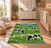 Dairy Cows by White Fence rug in a nursery beside a crib and dresser