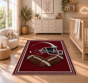 Football Helmet rug in a nursery beside a crib and dresser