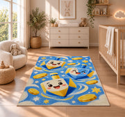Cute Dreidel Kids Rug in a nursery beside a crib and dresser