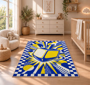 Pop Art Dreidel Rug in a nursery beside a crib and dresser