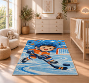 Little Hockey Star rug in a nursery beside a crib and dresser