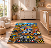 Construction truck hopscotch rug with numbered road tiles, diggers and traffic signs, displayed across a wood floor