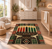 Mudcloth Kwanzaa Rug in a nursery beside a crib and dresser