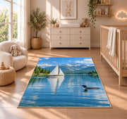 Sailboat and loon on lake rug in a nursery beside a crib and dresser