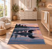 Loon and chick at sunrise rug in a nursery beside a crib and dresser