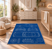 Classic car blueprint rug in a nursery beside a crib and dresser