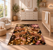 Champagne cheers rug in a nursery beside a crib and dresser