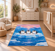 Penguins on Iceberg Rug in a nursery beside a crib and dresser