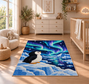 Aurora Penguin Rug in a nursery beside a crib and dresser