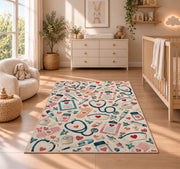 Nurse Essentials Pattern Rug in a nursery beside a crib and dresser