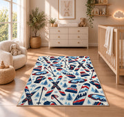 Ski gear pattern rug in a nursery beside a crib and dresser