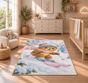 Teddy bear skier rug in a nursery beside a crib and dresser