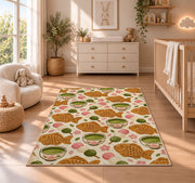 Taiyaki and Matcha Rug in a nursery beside a crib and dresser