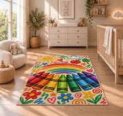 Crayon Rainbow Rug in a nursery beside a crib and dresser