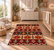 Southwestern Pumpkin Corn Rug in a nursery beside a crib and dresser