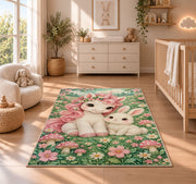 baby unicorn and bunny friend rug in a nursery beside a crib and dresser