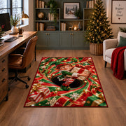 A smiling elf clutches a wrapped present while sitting inside a red and green spiral; rug shown in a decorated home office
