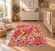 Pink cowgirl rug in a nursery beside a crib and dresser