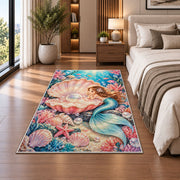 Pearl Shell and Mermaid Rug in a bedroom beside the bed