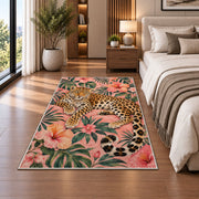 Leopard on Pink Hibiscus Rug in a bedroom beside the bed