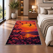 Birds at Sunset Rug in a bedroom beside the bed