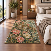 Chinoiserie Leopard and Peony Rug in a bedroom beside the bed