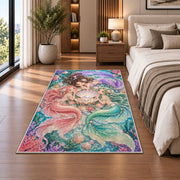 Three Mermaids and Shell Rug in a bedroom beside the bed