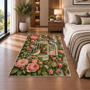 Vintage Birdcage and Roses Rug in a bedroom beside the bed