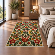 Folk Art Birds Rug in a bedroom beside the bed