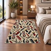 barber tools pattern rug in a bedroom beside the bed