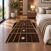 guitar fretboard rug in a bedroom beside the bed