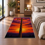 power line pole sunset rug in a bedroom beside the bed