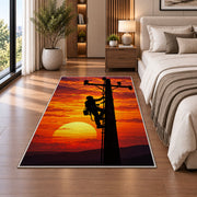 lineman climbing pole silhouette rug in a bedroom beside the bed