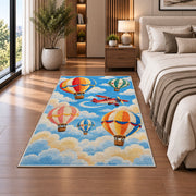 Hot Air Balloon Rug in a bedroom beside the bed