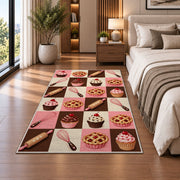Checkered bakery icons rug in a bedroom beside the bed