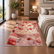 Strawberry tiered cake rug in a bedroom beside the bed