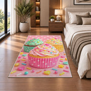 Cute pastel cupcakes rug in a bedroom beside the bed