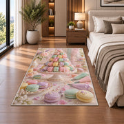 Pastel macaron tower rug in a bedroom beside the bed