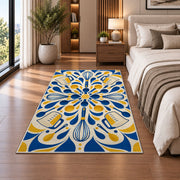 Geometric whisks and measuring cups rug in a bedroom beside the bed