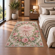 Rose wreath ballet rug in a bedroom beside the bed