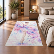 Watercolor ballerina rug in a bedroom beside the bed