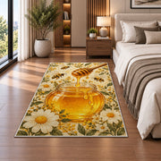 Honey Jar and Dipper Rug in a bedroom beside the bed