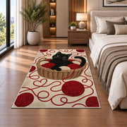 Black Cat Yarn Basket rug in a bedroom beside the bed