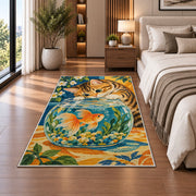 Tabby Cat and Goldfish rug in a bedroom beside the bed
