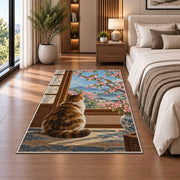 Cat Watching Sparrows rug in a bedroom beside the bed